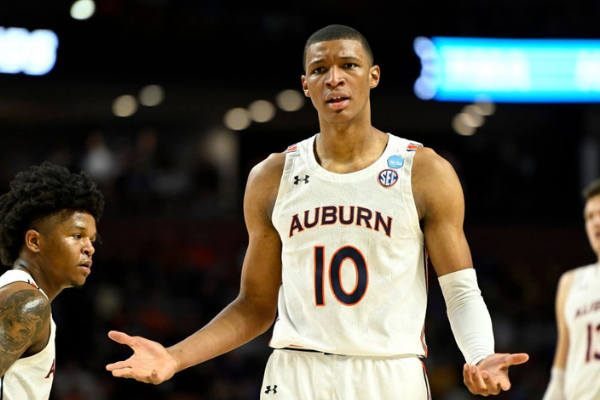 Jabari Smith #10 of the Auburn Tigers reacts in the second half against the Miami (Fl) Hurricanes during the second round of the 2022 NCAA Men's Basketball Tournament at Bon Secours Wellness Arena on March 20, 2022 in Greenville, South Carolina.